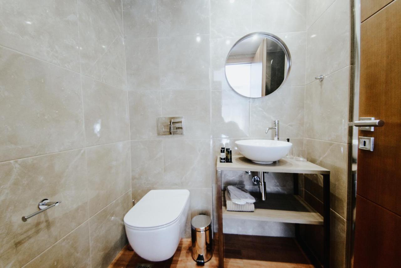 Voulis Attico Rooms & Apartments Atenas Exterior foto